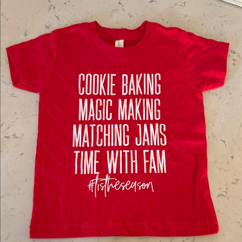 Small Shop Red Graphic Tee with Festive Text